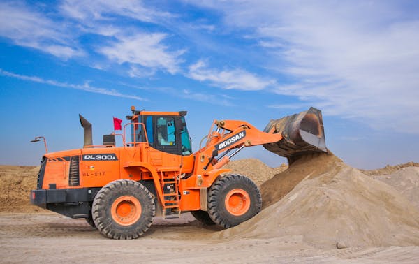 Heavy-Duty Orange Tractor